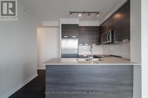 502 - 5025 Four Springs Avenue, Mississauga, ON - Indoor Photo Showing Kitchen With Double Sink