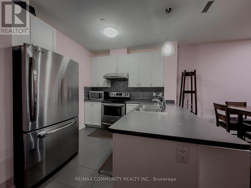 121 - 7400 Markham Road, Markham (Middlefield), ON - Indoor Photo Showing Kitchen With Double Sink