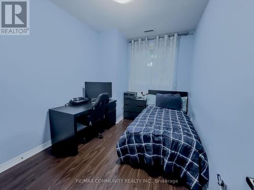 121 - 7400 Markham Road, Markham (Middlefield), ON - Indoor Photo Showing Bedroom