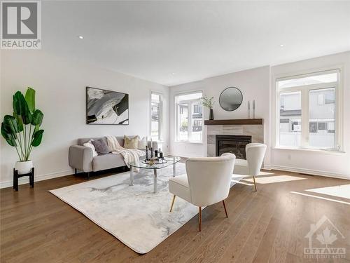 324 Big Dipper Street, Ottawa, ON - Indoor Photo Showing Living Room With Fireplace