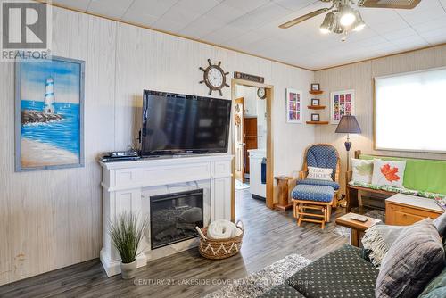 2730 Lone Birch Trail N, Ramara, ON - Indoor Photo Showing Other Room With Fireplace