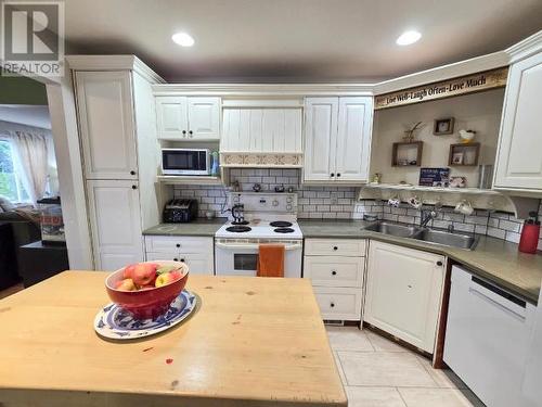 A-7421 Nootka Street, Powell River, BC - Indoor Photo Showing Kitchen With Double Sink