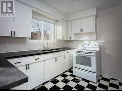 187 Black & white Kitchen, plus pantry closet. - 