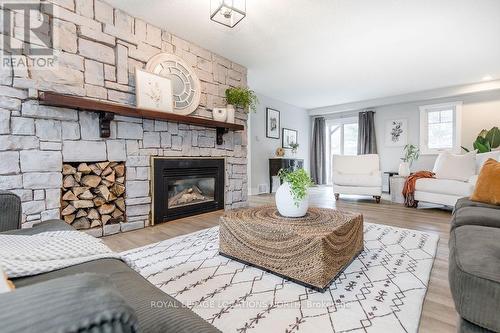 3 Matthew Court, Wasaga Beach, ON - Indoor Photo Showing Living Room With Fireplace