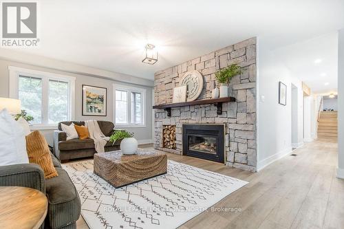 3 Matthew Court, Wasaga Beach, ON - Indoor Photo Showing Living Room With Fireplace