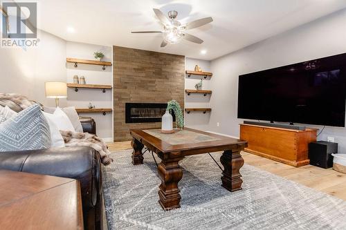 3 Matthew Court, Wasaga Beach, ON - Indoor Photo Showing Living Room With Fireplace