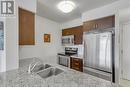 810 - 61 Heintzman Street, Toronto (Junction Area), ON  - Indoor Photo Showing Kitchen With Stainless Steel Kitchen With Double Sink 