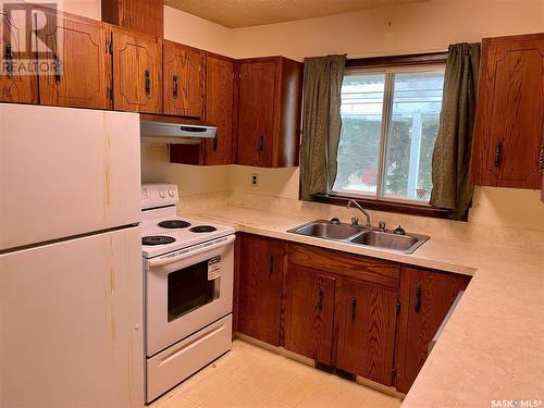 212 2Nd Street E, Nipawin, SK - Indoor Photo Showing Kitchen With Double Sink