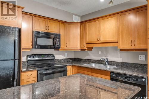 222 105 Lynd Crescent, Saskatoon, SK - Indoor Photo Showing Kitchen With Double Sink