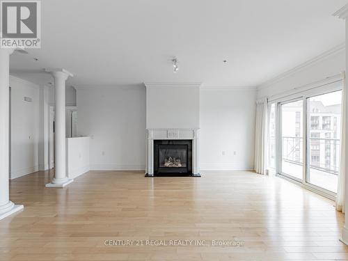 Ph7 - 12 Rean Drive, Toronto, ON - Indoor Photo Showing Living Room With Fireplace