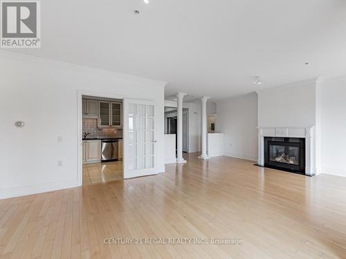 Ph7 - 12 Rean Drive, Toronto, ON - Indoor Photo Showing Living Room With Fireplace