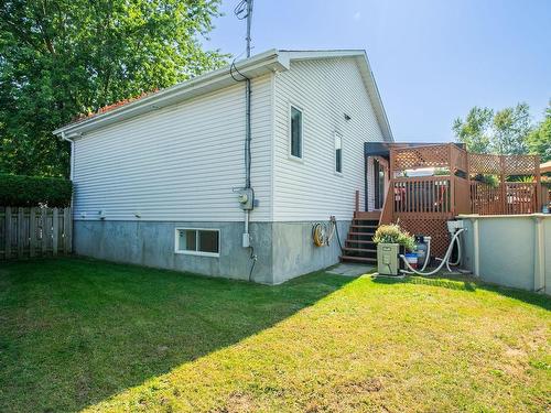 Back facade - 961 Rue Jean-Casavan, Lavaltrie, QC - Outdoor With Above Ground Pool With Exterior