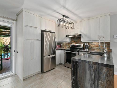 Cuisine - 961 Rue Jean-Casavan, Lavaltrie, QC - Indoor Photo Showing Kitchen With Double Sink With Upgraded Kitchen