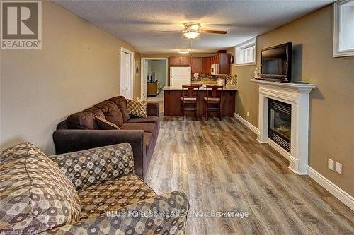 1152 Oakcrossing Road, London, ON - Indoor Photo Showing Living Room With Fireplace