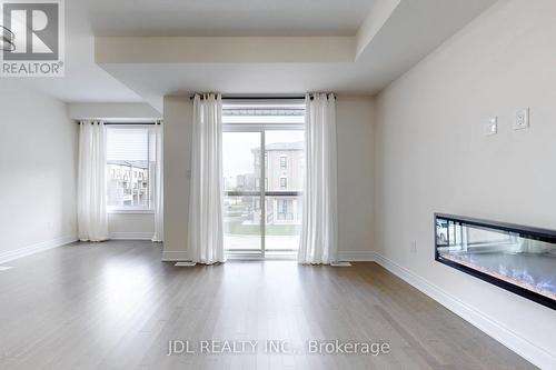 173 Tennant Circle, Vaughan, ON - Indoor With Fireplace