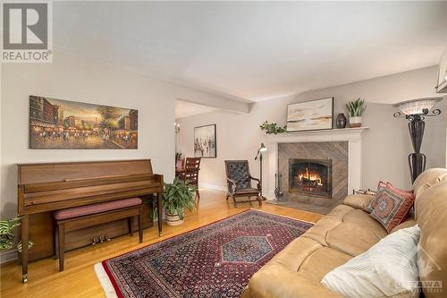 Living Room - 4260 Ramsayville Road, Ottawa, ON - Indoor Photo Showing Living Room With Fireplace