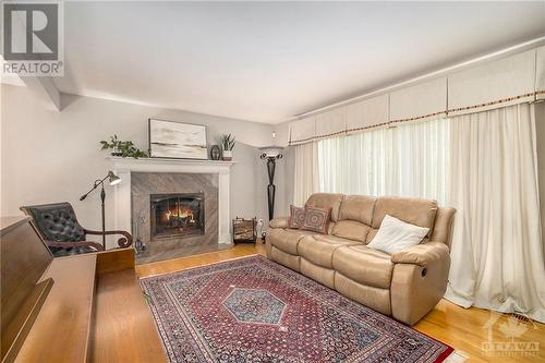 Living Room - 4260 Ramsayville Road, Ottawa, ON - Indoor Photo Showing Living Room With Fireplace