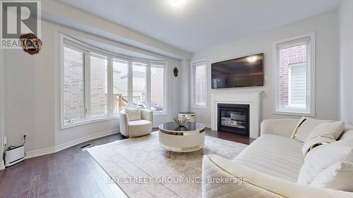 4 Waterleaf Road, Markham (Cornell), ON - Indoor Photo Showing Living Room With Fireplace