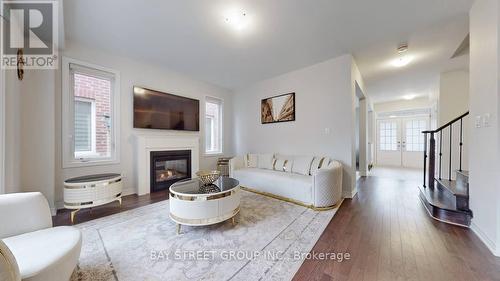 4 Waterleaf Road, Markham, ON - Indoor Photo Showing Living Room With Fireplace