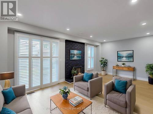 27 Green Spring Drive, Toronto (Milliken), ON - Indoor Photo Showing Living Room With Fireplace