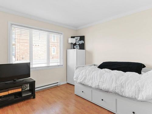 Chambre Ã Â coucher - 2-8850 Place Des Roseaux, Brossard, QC - Indoor Photo Showing Bedroom