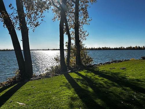 Vue sur l'eau - 2-8850 Place Des Roseaux, Brossard, QC - Outdoor With Body Of Water With View