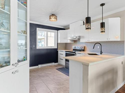 Cuisine - 2-8850 Place Des Roseaux, Brossard, QC - Indoor Photo Showing Kitchen With Upgraded Kitchen