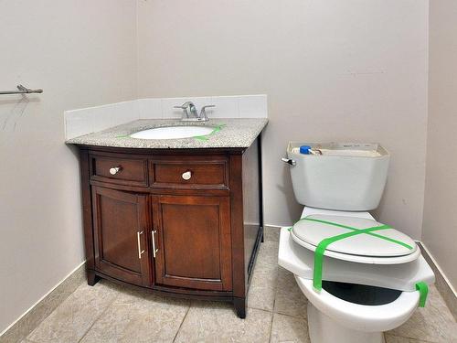 Powder room - 239 Rue Blue Haven, Dollard-Des-Ormeaux, QC - Indoor Photo Showing Bathroom