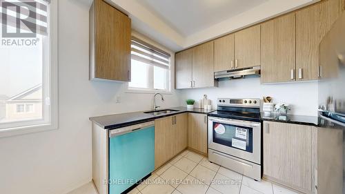 1396 Coral Springs Path, Oshawa (Taunton), ON - Indoor Photo Showing Kitchen With Double Sink