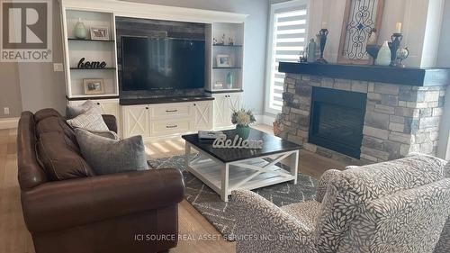 497 West Belle River Road, Essex, ON - Indoor Photo Showing Living Room With Fireplace