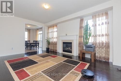 3 Furrow Street, Markham (Wismer), ON - Indoor Photo Showing Living Room With Fireplace