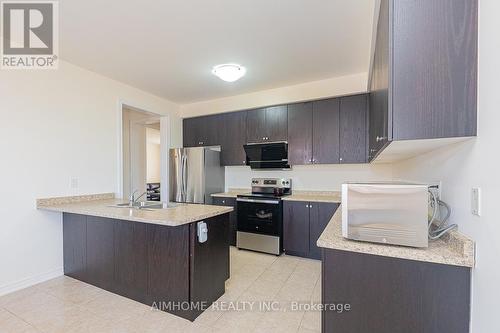 3 Furrow Street, Markham (Wismer), ON - Indoor Photo Showing Kitchen With Double Sink