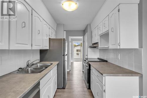 3342 Diefenbaker Drive, Saskatoon, SK - Indoor Photo Showing Kitchen With Double Sink