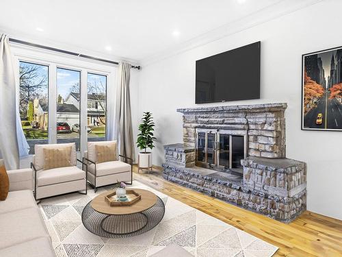 Family room - 158 Bexhill Drive, Beaconsfield, QC - Indoor Photo Showing Living Room With Fireplace