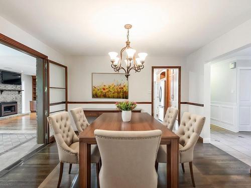 Salle Ã  manger - 452 Crois. Jubilee, Beaconsfield, QC - Indoor Photo Showing Dining Room With Fireplace