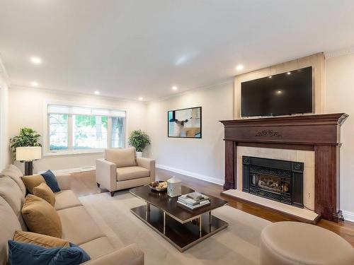 Salon - 452 Crois. Jubilee, Beaconsfield, QC - Indoor Photo Showing Living Room With Fireplace