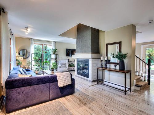 Vue d'ensemble - 772 Rue Galbrand, Laval (Sainte-Dorothée), QC - Indoor Photo Showing Living Room With Fireplace