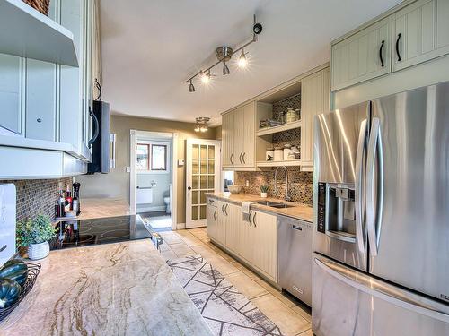 Cuisine - 772 Rue Galbrand, Laval (Sainte-Dorothée), QC - Indoor Photo Showing Kitchen With Double Sink