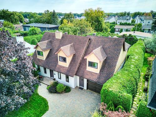 Garden - 772 Rue Galbrand, Laval (Sainte-Dorothée), QC - Outdoor With Above Ground Pool