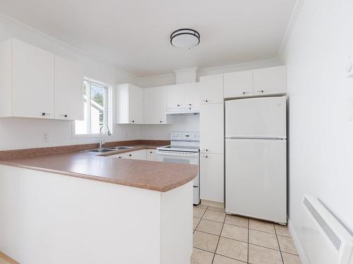 Cuisine - 85 Rue De Neuville, L'Île-Perrot, QC - Indoor Photo Showing Kitchen With Double Sink