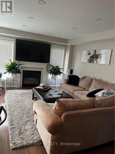 4236 Thomas Alton Boulevard, Burlington, ON - Indoor Photo Showing Living Room With Fireplace