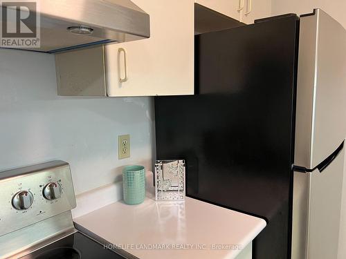 811 - 44 Gerrard Street W, Toronto, ON - Indoor Photo Showing Laundry Room