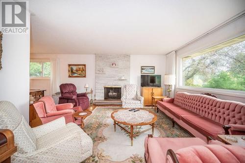 11 Avon Road, Deep River, ON - Indoor Photo Showing Living Room With Fireplace