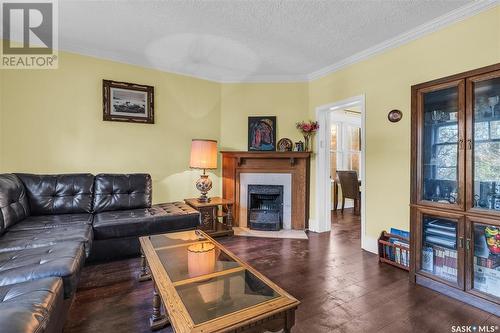 108 8Th Street E, Saskatoon, SK - Indoor Photo Showing Living Room With Fireplace