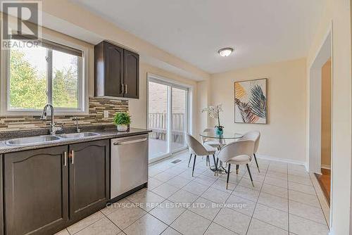 209 Queen Mary Drive, Brampton (Fletcher'S Meadow), ON - Indoor Photo Showing Kitchen With Double Sink