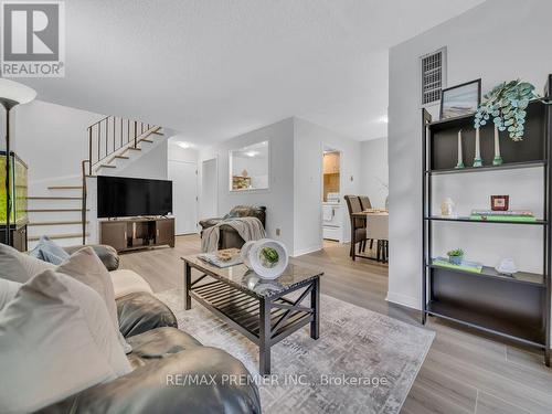 225 - 2095 Roche Court, Mississauga, ON - Indoor Photo Showing Living Room