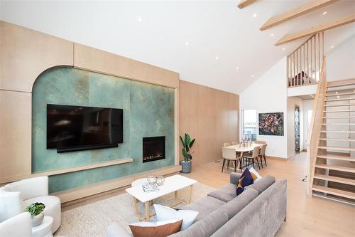 216 Butterfly Way, Winnipeg, MB - Indoor Photo Showing Living Room With Fireplace