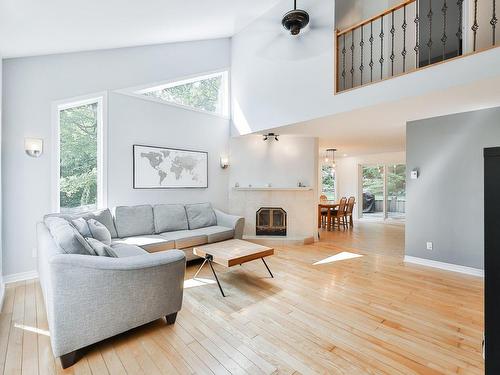 Living room - 108 Rue Des Pignons, Saint-Colomban, QC - Indoor Photo Showing Living Room With Fireplace