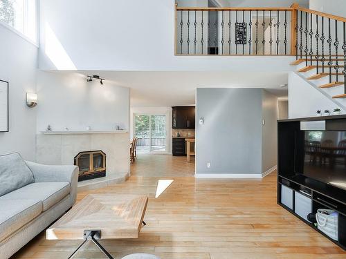 Overall view - 108 Rue Des Pignons, Saint-Colomban, QC - Indoor Photo Showing Living Room With Fireplace