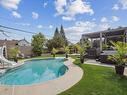 Backyard - 45 Rue Jean-Paul-Lemieux, Notre-Dame-De-L'Île-Perrot, QC  - Outdoor With In Ground Pool 